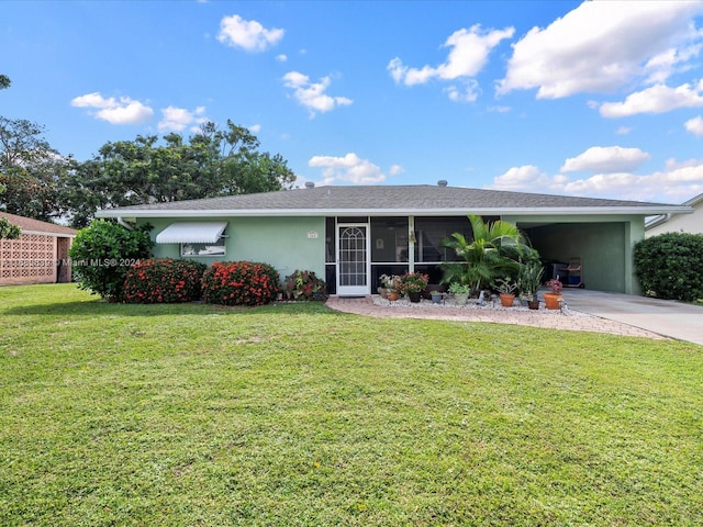 ranch-style home featuring a sunroom and a front lawn