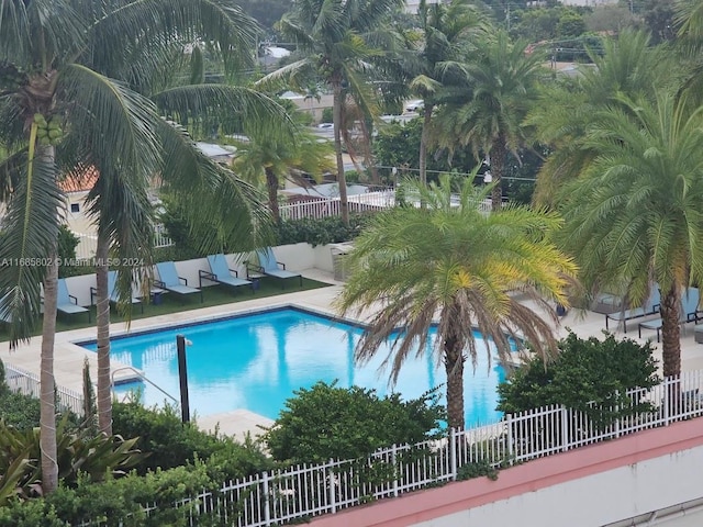 view of swimming pool with a patio