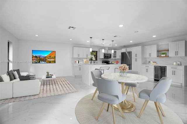 dining space featuring beverage cooler