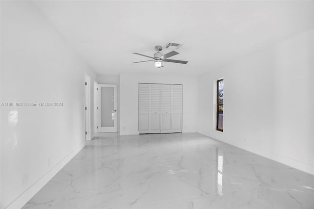 empty room featuring ceiling fan