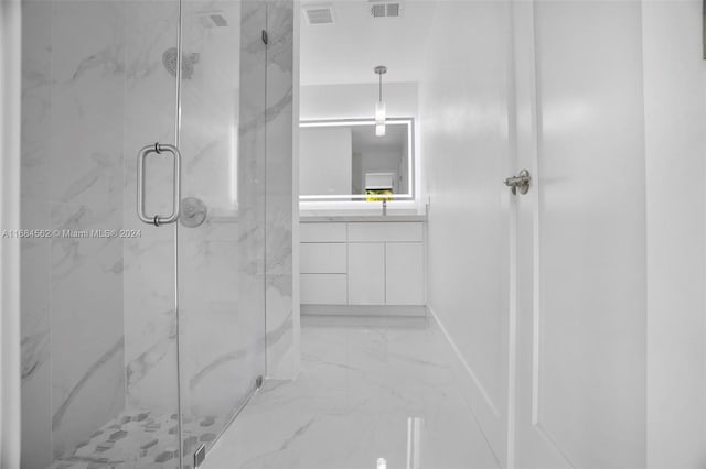 bathroom featuring vanity and walk in shower