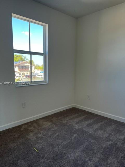 view of carpeted empty room