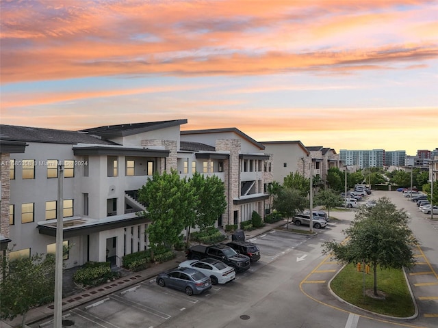 view of outdoor building at dusk