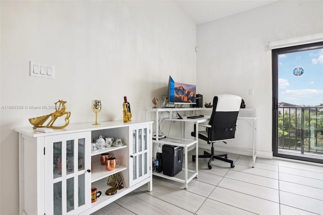 office space with light tile patterned floors