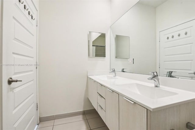 bathroom featuring vanity and tile patterned flooring