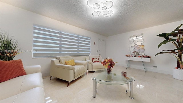 living room featuring a textured ceiling