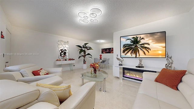 living room featuring a textured ceiling