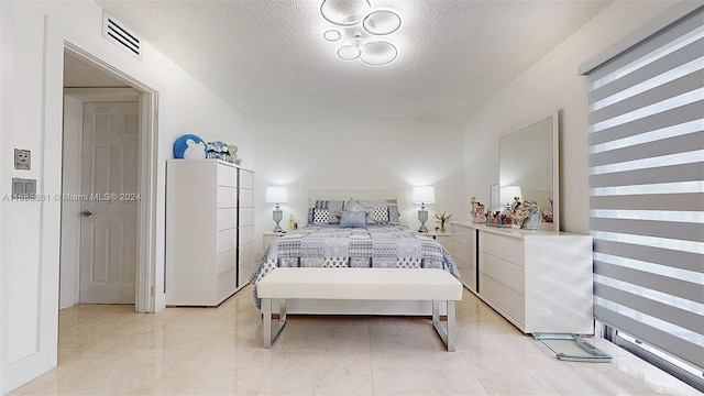 bedroom with a textured ceiling