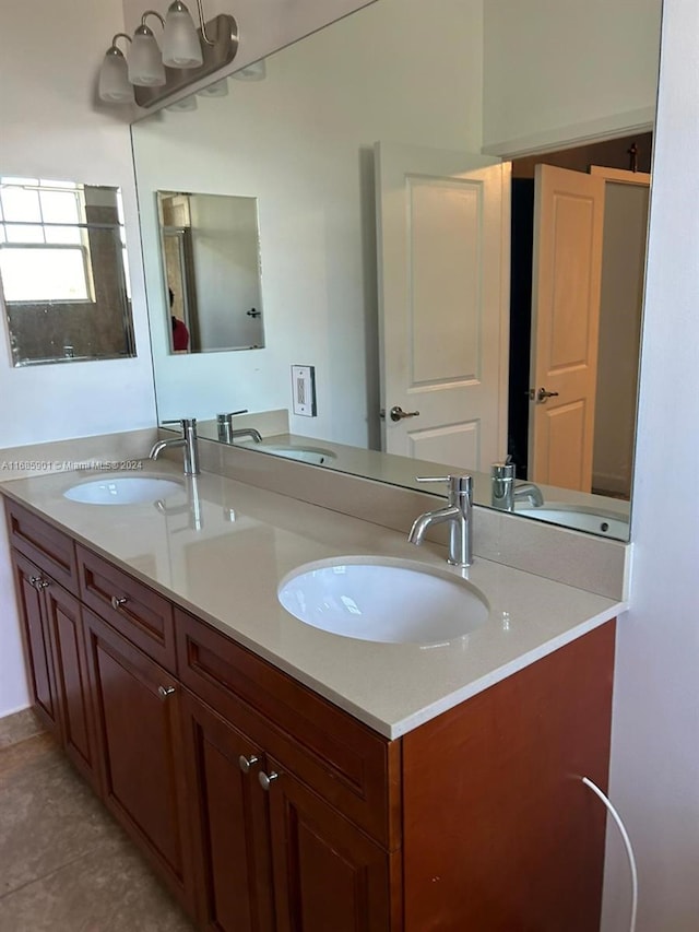 bathroom featuring vanity and tile patterned flooring