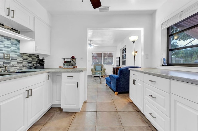 kitchen featuring white cabinetry, stainless steel appliances, and sink