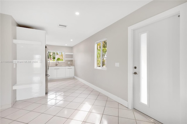 interior space featuring light tile patterned flooring