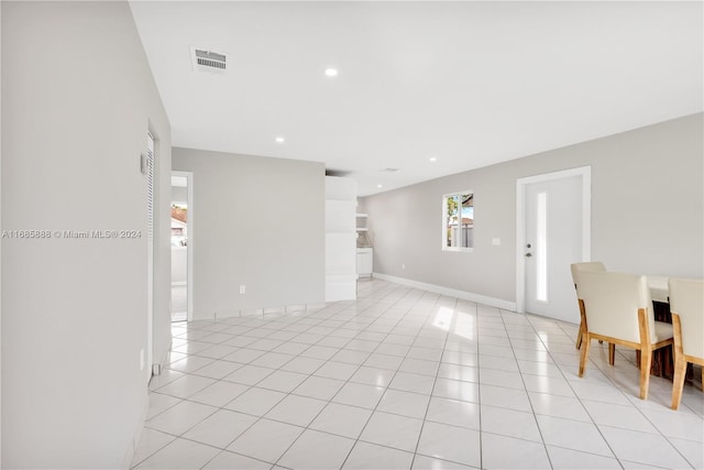 interior space featuring light tile patterned floors