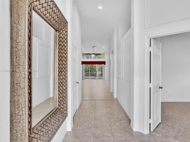 hallway with light tile patterned floors