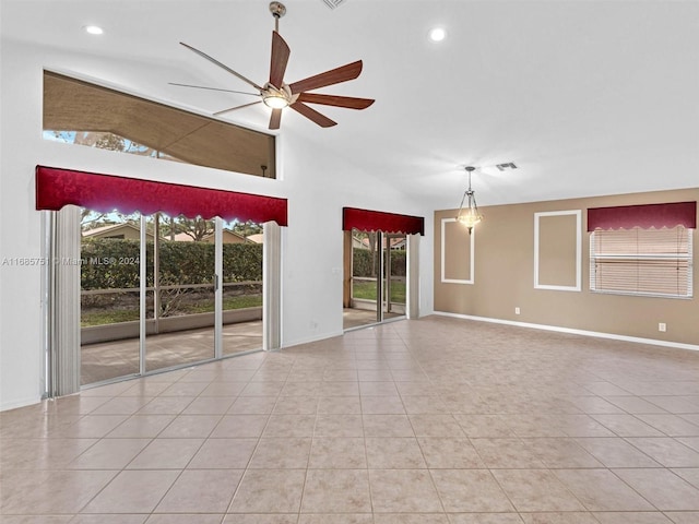 tiled spare room with ceiling fan, baseboards, high vaulted ceiling, and recessed lighting