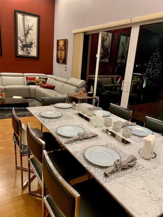 dining area with wood-type flooring