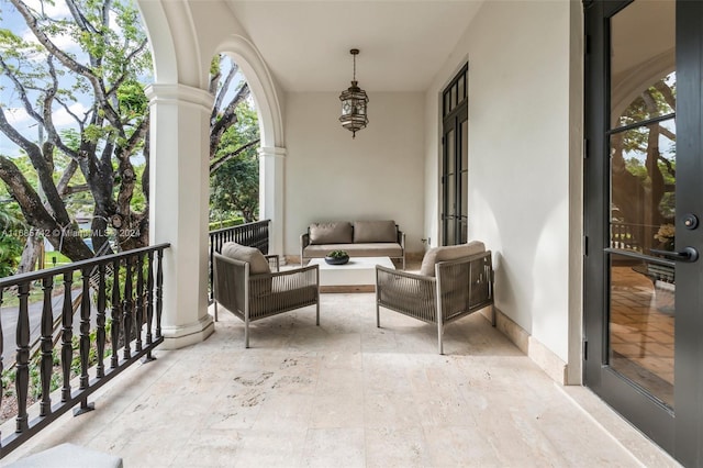 balcony with an outdoor hangout area