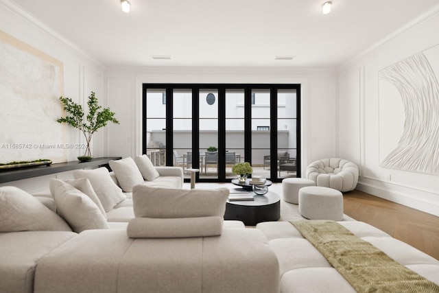 living room featuring a healthy amount of sunlight, crown molding, and parquet floors