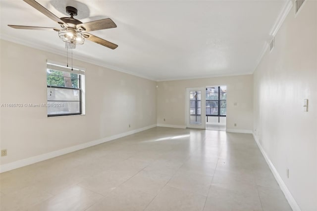 unfurnished room with crown molding, a healthy amount of sunlight, and ceiling fan