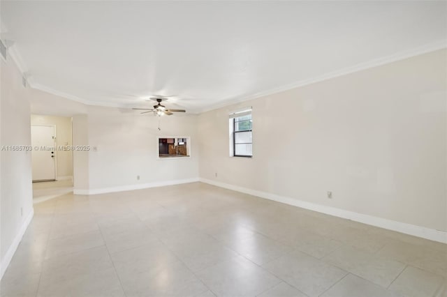 empty room with ceiling fan and ornamental molding