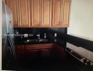 kitchen with backsplash and sink