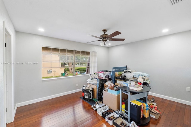 misc room featuring dark hardwood / wood-style floors and ceiling fan