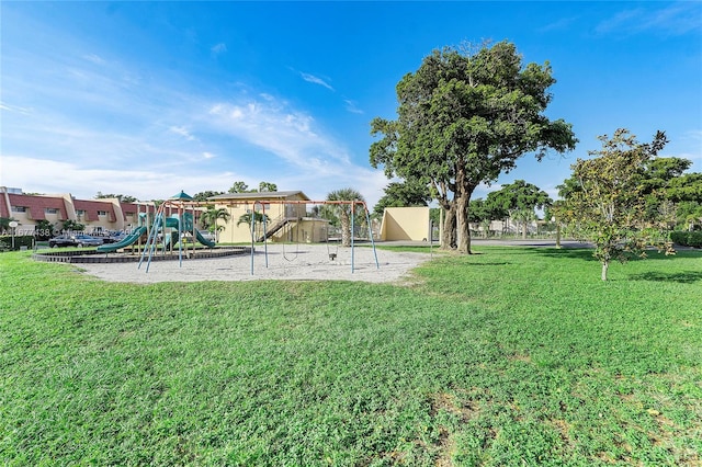 view of playground with a yard