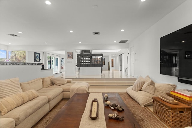 living room featuring tile patterned floors