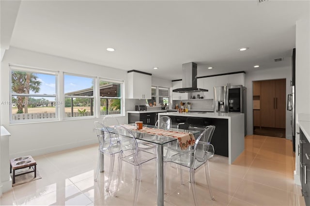 dining space with light tile patterned floors