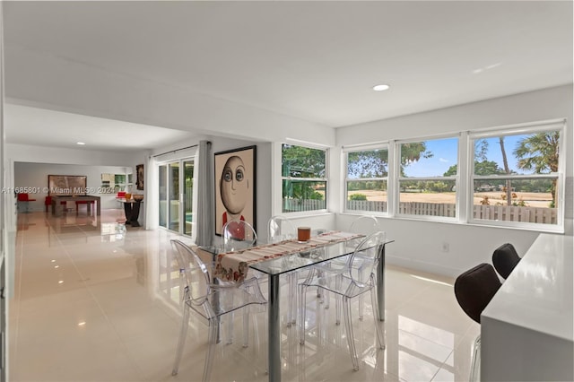 view of tiled dining space