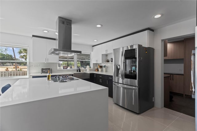 kitchen featuring white cabinets, stainless steel refrigerator with ice dispenser, exhaust hood, and black electric cooktop