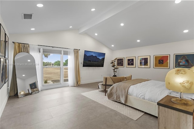 bedroom featuring lofted ceiling with beams