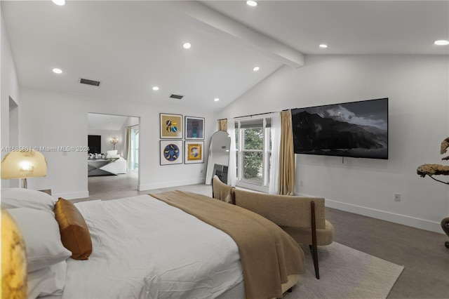 bedroom featuring vaulted ceiling with beams