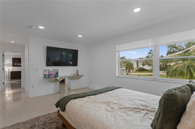 bedroom featuring light tile patterned floors