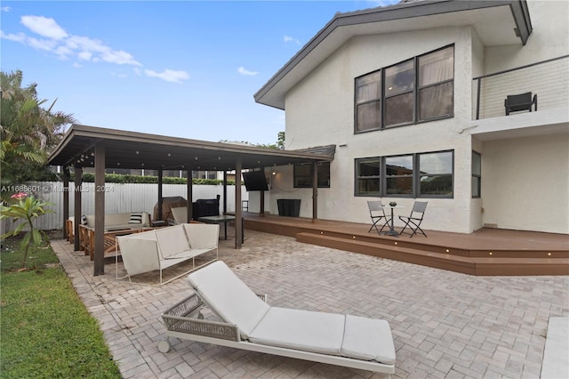 view of patio / terrace with outdoor lounge area and a deck