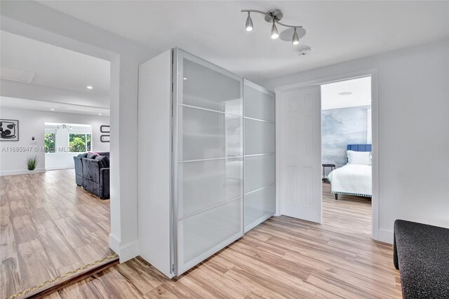 hall featuring light hardwood / wood-style flooring