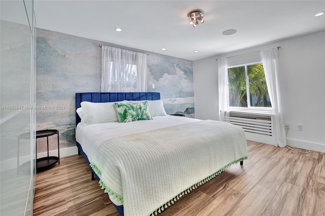 bedroom featuring hardwood / wood-style floors