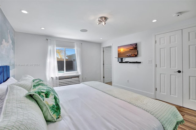 bedroom featuring hardwood / wood-style floors