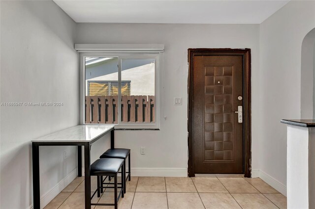 view of tiled entrance foyer