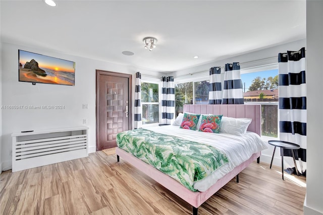 bedroom featuring light wood-type flooring