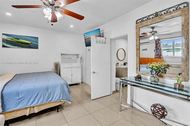 tiled bedroom with a wall mounted AC and ceiling fan