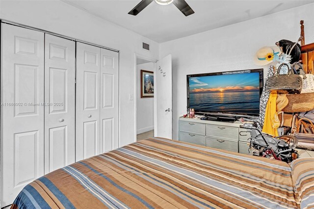 bedroom featuring a closet and ceiling fan