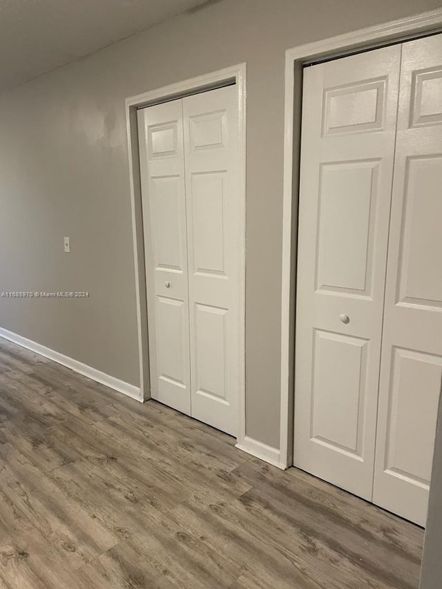 unfurnished bedroom featuring hardwood / wood-style floors