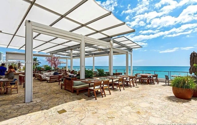 view of patio featuring a water view