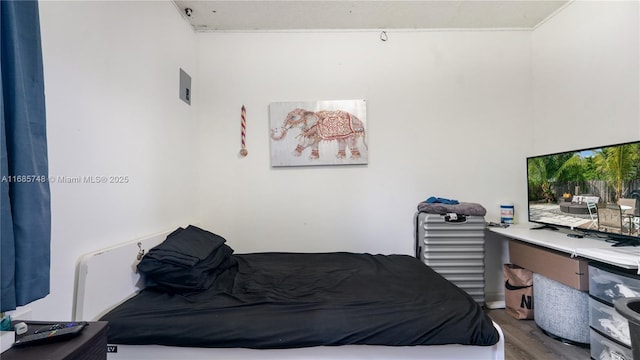 bedroom featuring hardwood / wood-style flooring