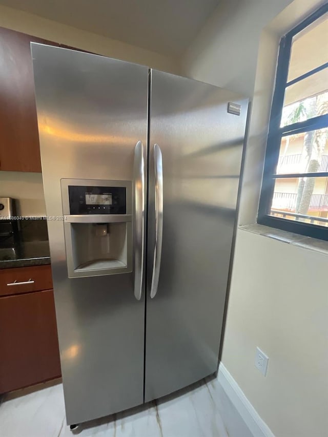 details with stainless steel refrigerator with ice dispenser