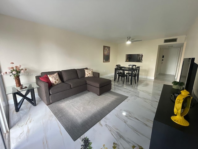 living room with ceiling fan