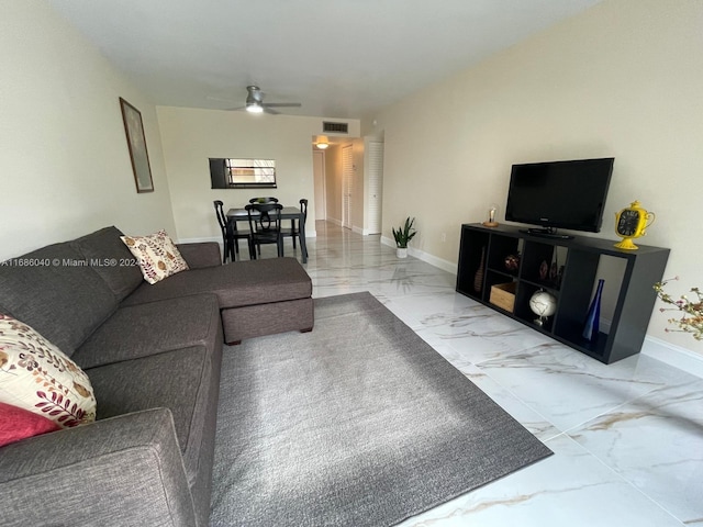 living room with ceiling fan