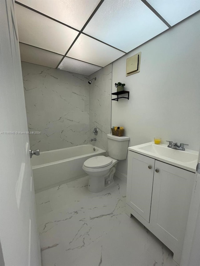 full bathroom featuring vanity, toilet, and tiled shower / bath combo