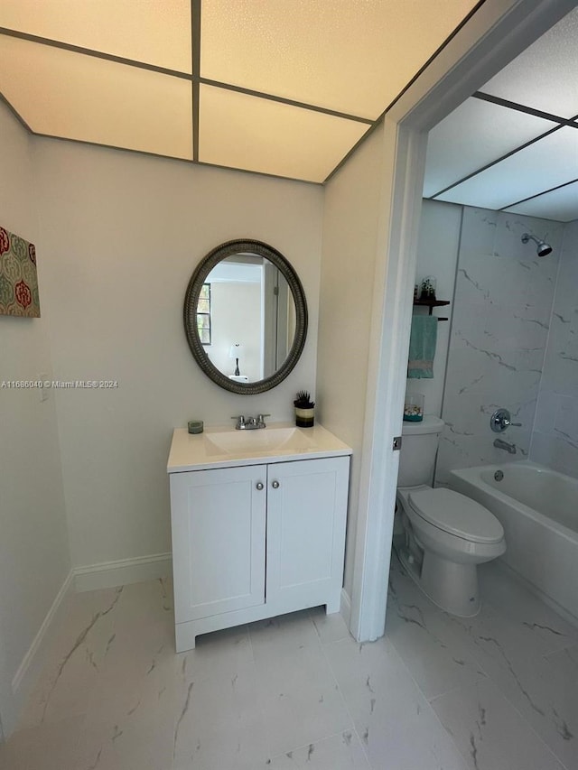 full bathroom featuring vanity, toilet, and tiled shower / bath