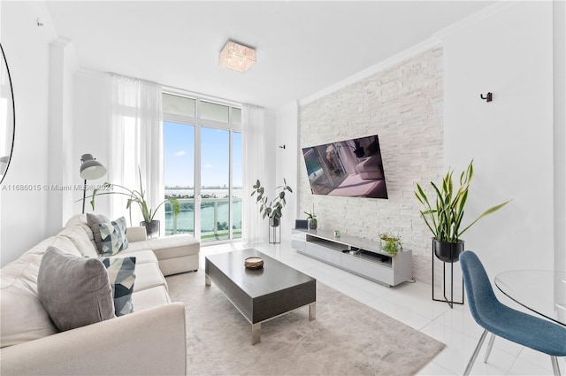 living room with crown molding and light tile patterned floors